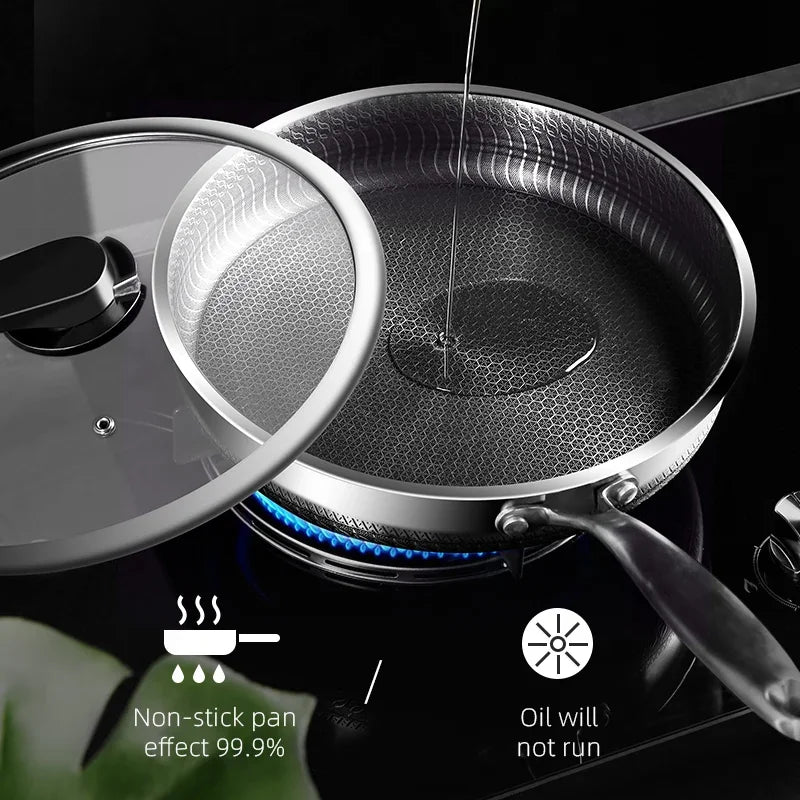 Stainless steel frying pan with non-stick surface on a stove, featuring text about non-stick effect.

