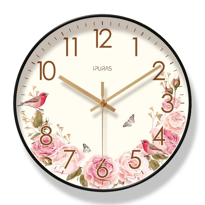 Decorative wall clock with floral and bird design on a white background

