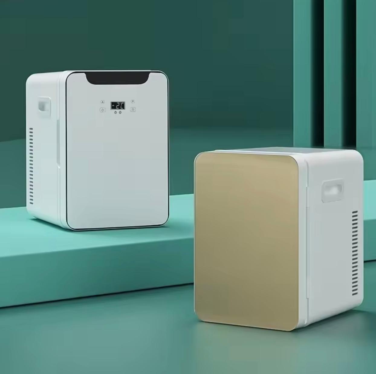 Two compact portable power stations shown on a teal studio set. One is white with a black top panel and small digital display, standing on a raised platform.

