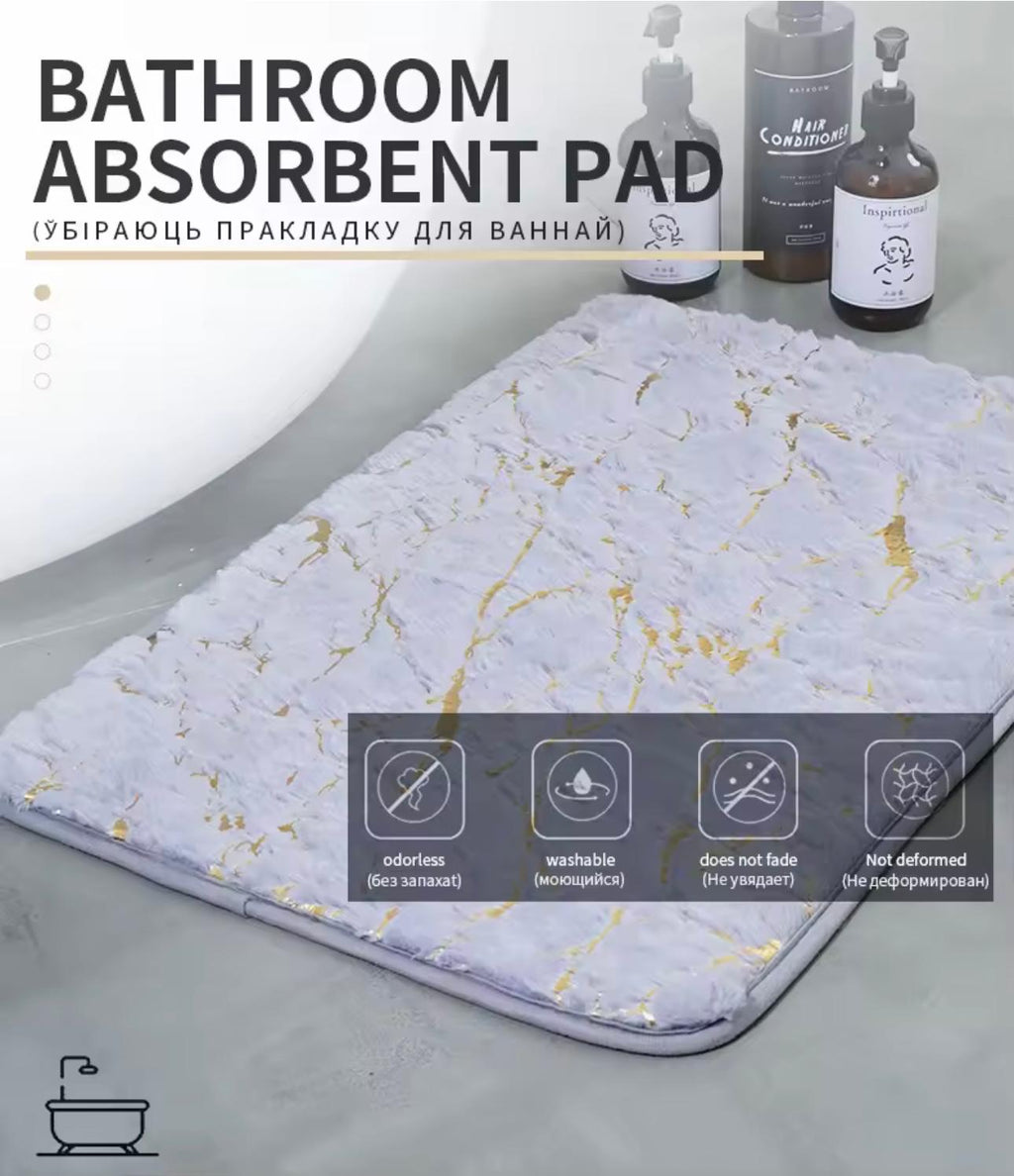 bathroom absorbent mat with a white and light gray marble pattern