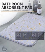bathroom absorbent mat with a white and light gray marble pattern