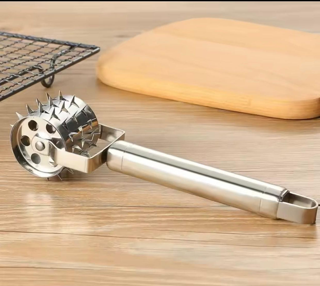 stainless steel meat roller tool with a long handle