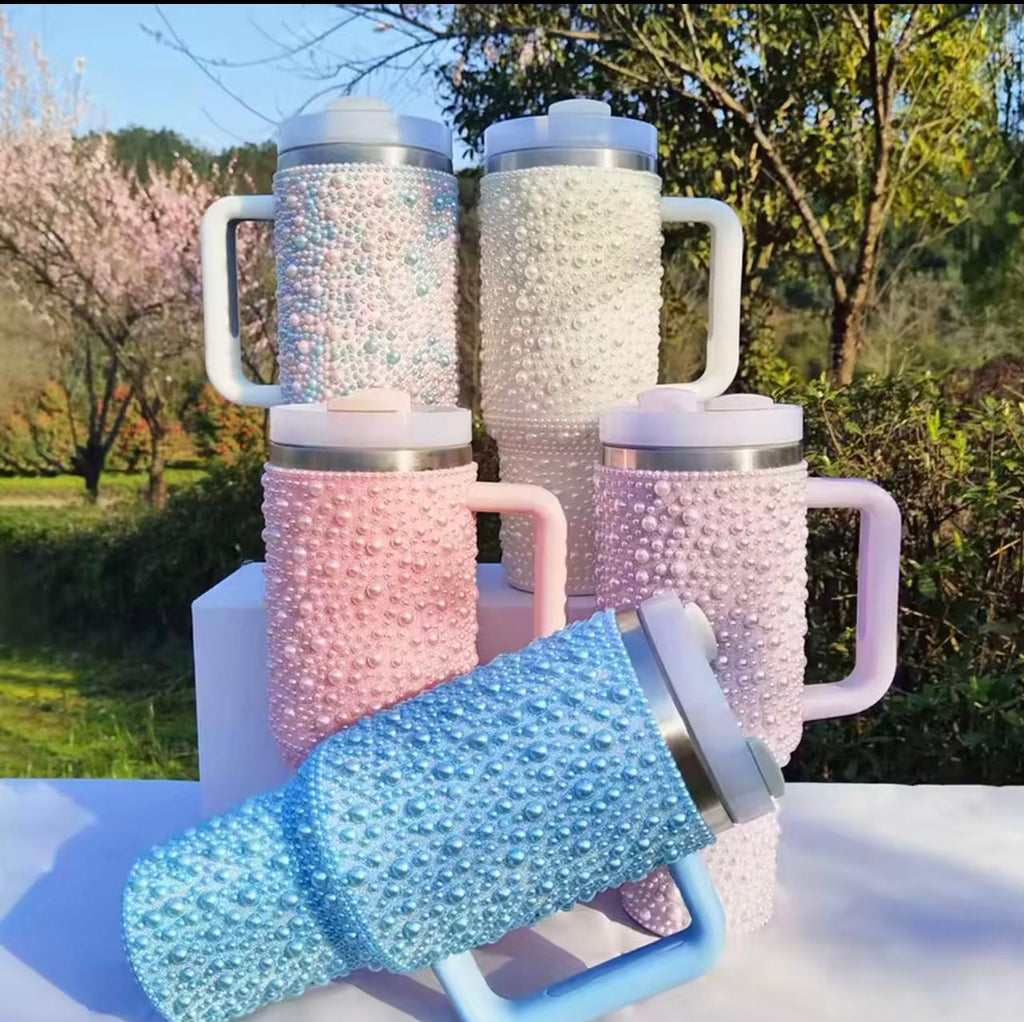 Four handleless tumblers with a textured