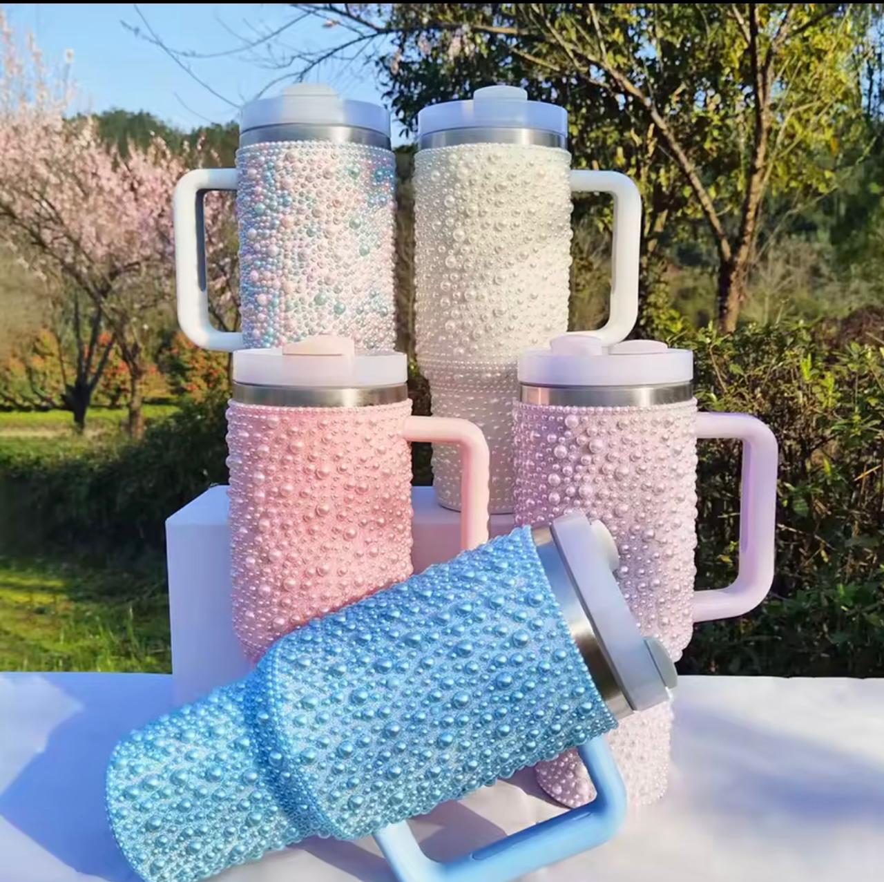 Four handleless tumblers with a textured