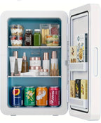 A white mini refrigerator shown open, stocked with assorted beverages, jars, bottles, and packaged goods, against a clean white background.


