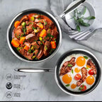 Two stainless steel pans with black mesh bottoms