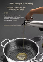 A stainless steel pot with a dark honeycomb