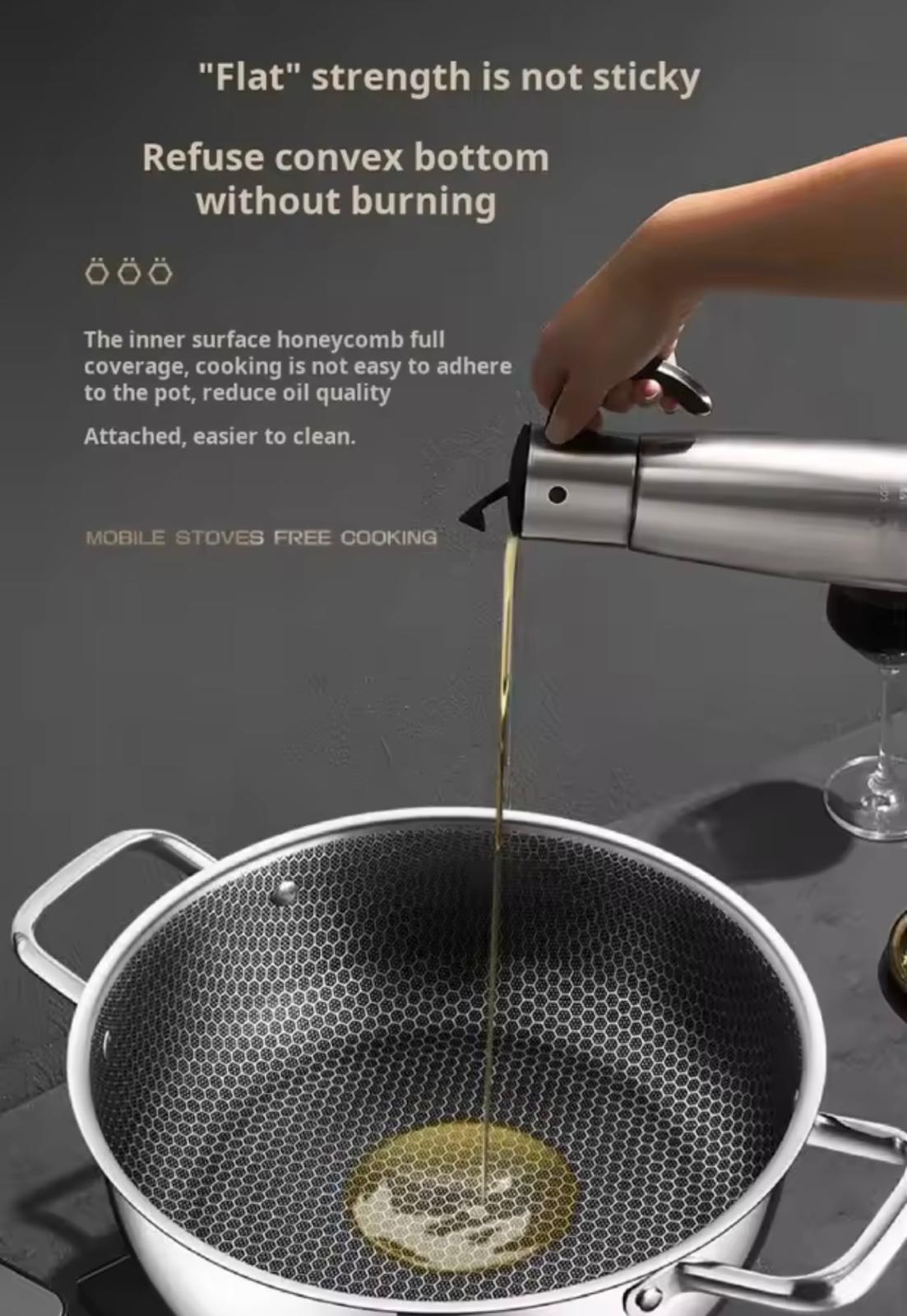 A stainless steel pot with a dark honeycomb