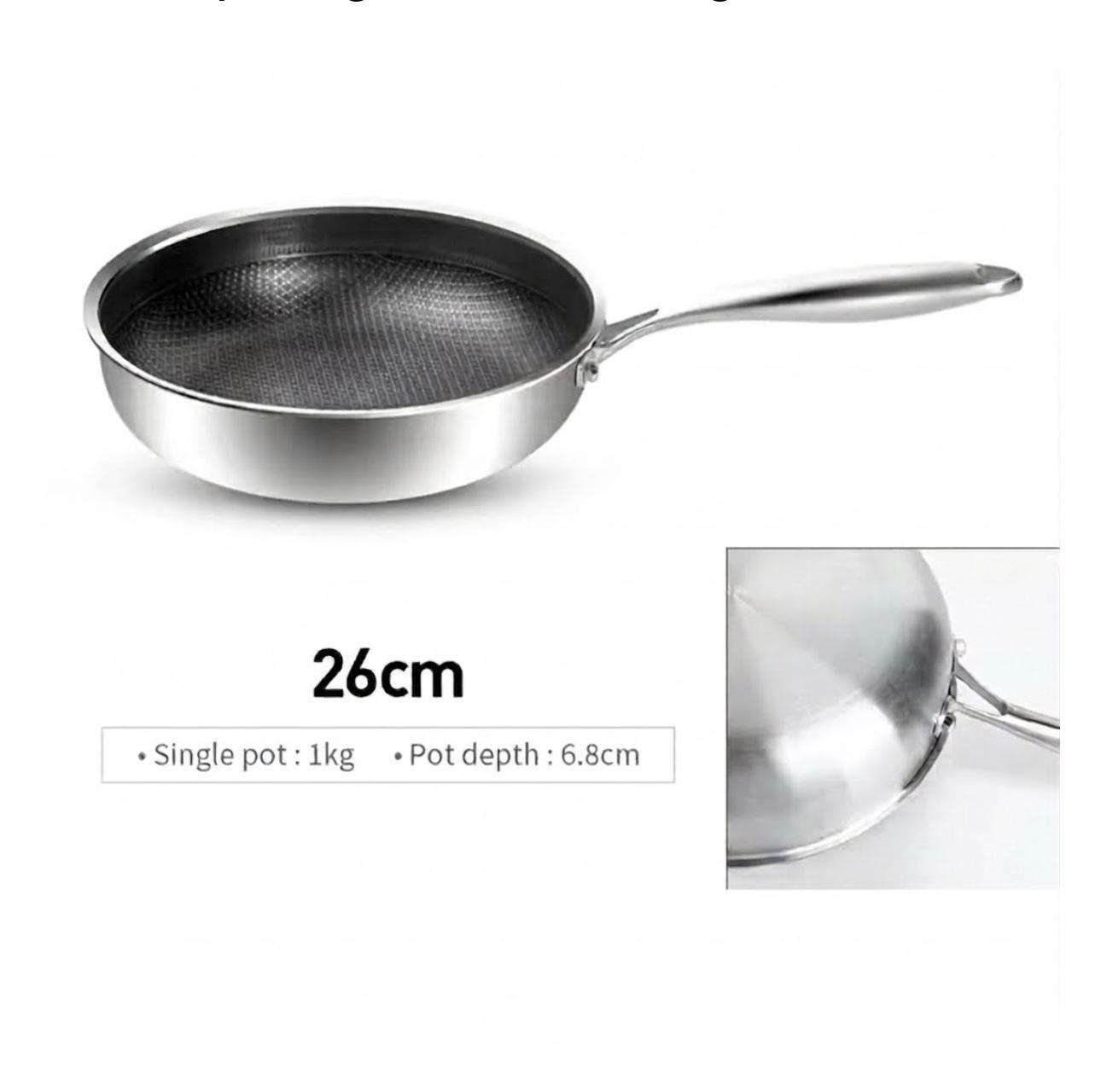 A stainless steel frying pan with a textured non-stick interior, shown on a white background with text indicating 26cm size and a small inset detail of the pot depth.

